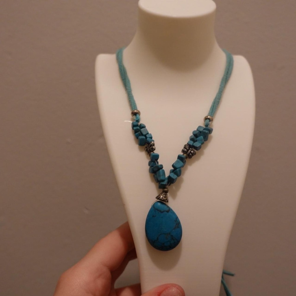 Turquoise colored pendant necklace